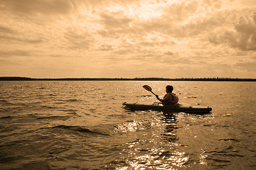 Image showing Rowing at sunset