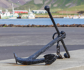 Image showing Old anchor on the sea coast