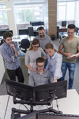 Image showing startup business people group working as team to find solution