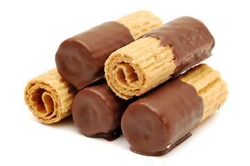 Image showing Wafer rolls in chocolate isolated on white background