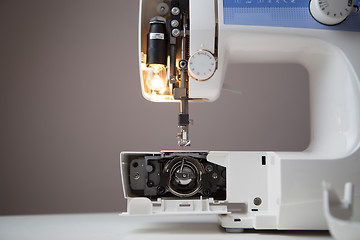 Image showing Sewing machine with open spool