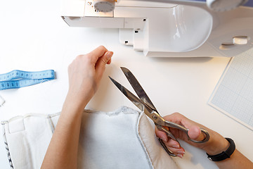 Image showing Woman background of sewing machine