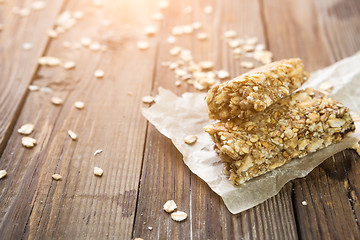 Image showing Dietary bars on wooden table