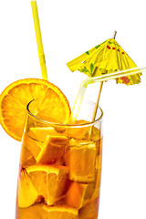 Image showing Close up orange cooler cocktail with drinking straw on white background