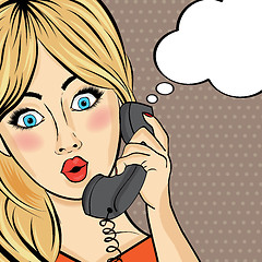 Image showing Surprised pop art  woman chating on retro phone . Comic woman wi