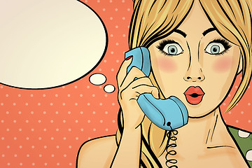 Image showing Surprised pop art woman chatting on retro phone . Comic woman wi