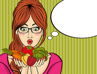 Image showing Surprised pop art  woman that holds vegetables  in her hands . C
