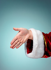 Image showing Photo of Santa Claus hand in gesture of a handshake