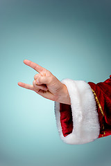 Image showing Photo of Santa Claus hand in rocker gesture