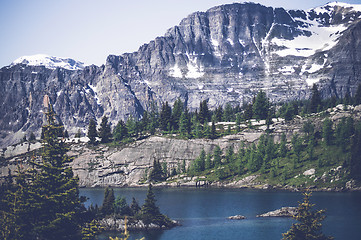 Image showing Large mountain by an idyllic lake