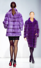 Image showing winter fashion elegant Two Woman clothes in mink fur purple coat