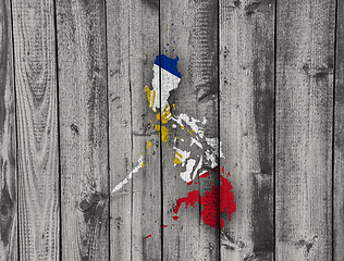 Image showing Map and flag of the Philippines on weathered wood