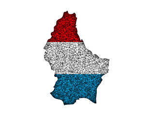 Image showing Map and flag of Luxembourg on poppy seeds