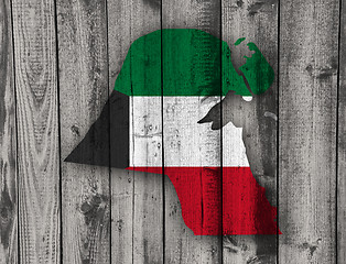 Image showing Map and flag of Kuwait on weathered wood