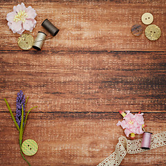 Image showing Lace and thread on wooden background