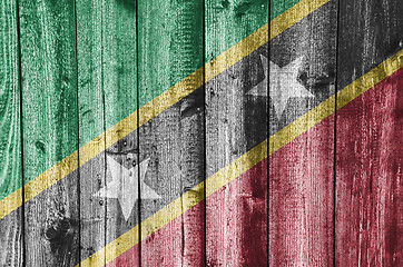 Image showing Flag of Saint Kitts and Nevis on weathered wood