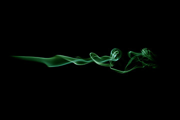 Image showing Green smoke wave isolated on white. Green smoke trail isolated on white. Horizontal wave.