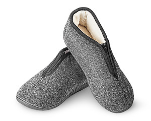 Image showing Dark gray slippers with fur one on another