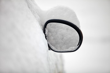 Image showing rearview mirror covered with snow