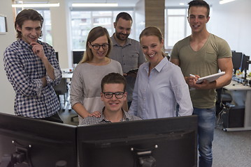 Image showing group of young startup business people standing as team