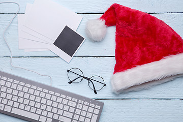 Image showing Santa hat, glasses, blank photo