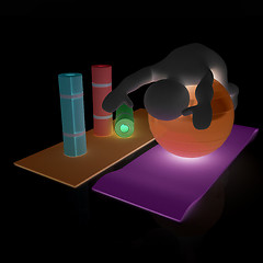 Image showing 3d man on a karemat with fitness ball. 3D illustration