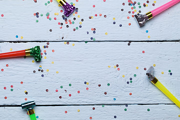 Image showing Confetti, photo on wooden floor