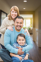 Image showing Mixed Race Family Portrait Inside Their New House.