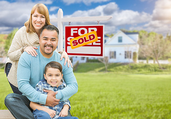 Image showing Mixed Race Family In Front of House and Sold For Sale Real Estat