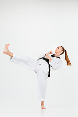 Image showing The karate girl with black belt