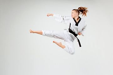 Image showing The karate girl with black belt