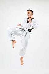 Image showing The karate man with black belt