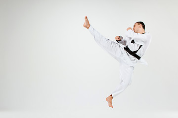 Image showing The karate man with black belt