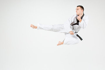 Image showing The karate man with black belt