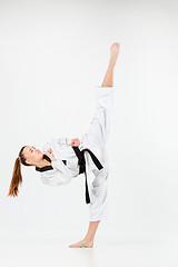 Image showing The karate girl with black belt