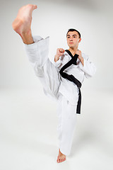 Image showing The karate man with black belt