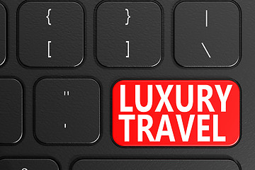 Image showing Luxury Travel on black keyboard