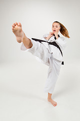 Image showing The karate girl with black belt