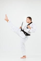 Image showing The karate man with black belt