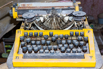 Image showing Retro broken typewriter in abandoned place