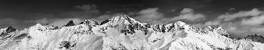 Image showing Large panoramic view on snowy mountains in sunny day