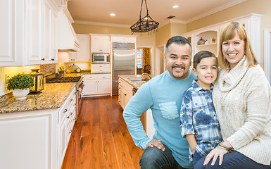 Image showing Young Mixed Race Family Having Fun in Custom Kitchen