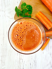 Image showing Juice carrot with vegetables on board top