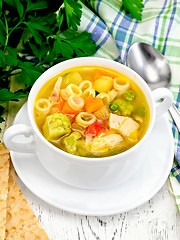 Image showing Soup Minestrone in white bowl on board