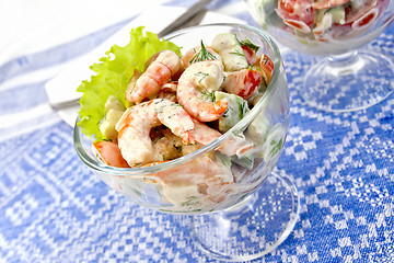 Image showing Salad with shrimp and avocado in glass on tablecloth
