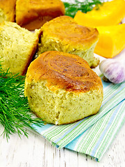 Image showing Scones pumpkin with garlic and dill on towel