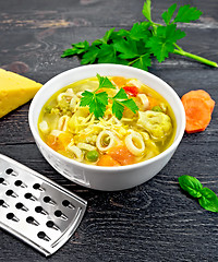 Image showing Soup Minestrone in bowl on black board