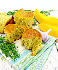 Image showing Scones pumpkin with garlic and dill on light board