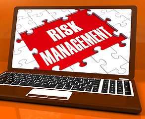 Image showing Risk Management On Laptop Showing Risky Analysis