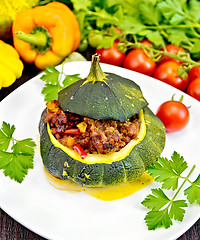 Image showing Squash green stuffed with meat on board